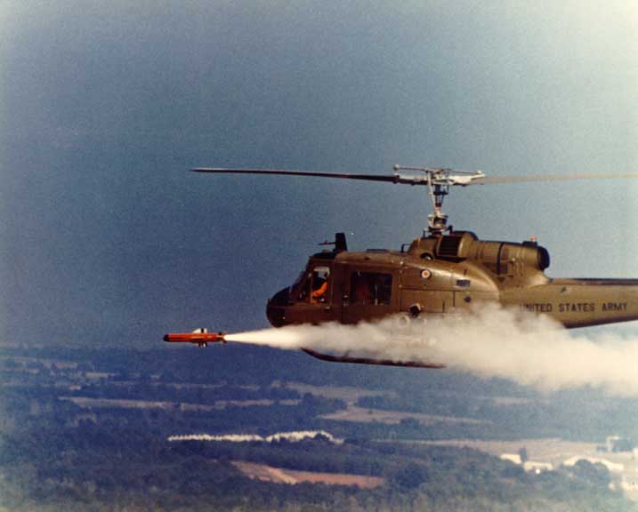 Image: UH-1B Huey firing a Hellfire missile