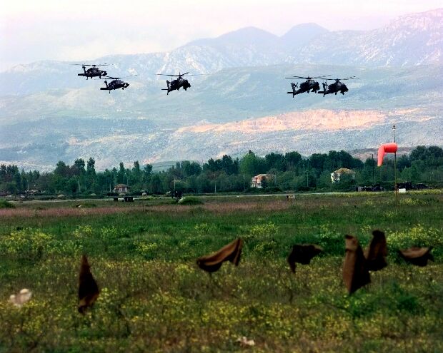 Image: AH-64 and UH-60 arriving at Rinas Airport