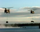 Image:Two U.S. Army CH-47 Chinook helicopters sling load Humvees during Northern Edge 98.