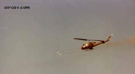 Image: UH-1M launching a pair of 2.75 inch rockets
