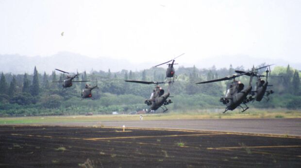 Image: Three OH-58A/Cs and three AH-1Fs take off from Wheeler Army Airfield